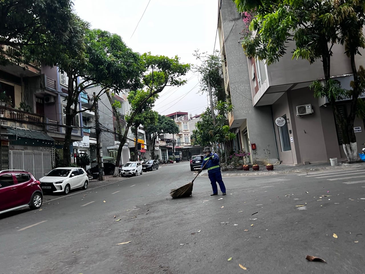 street cleaner sweeping in Lao Cai early morning