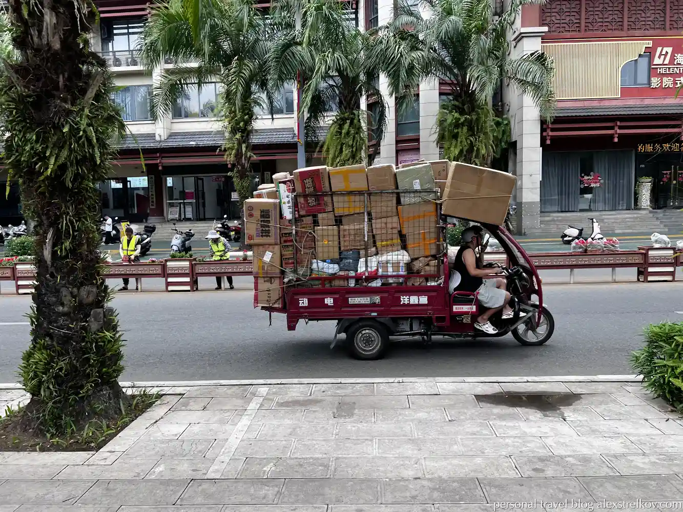 electric cargo tricycle loaded boxes street Hekou