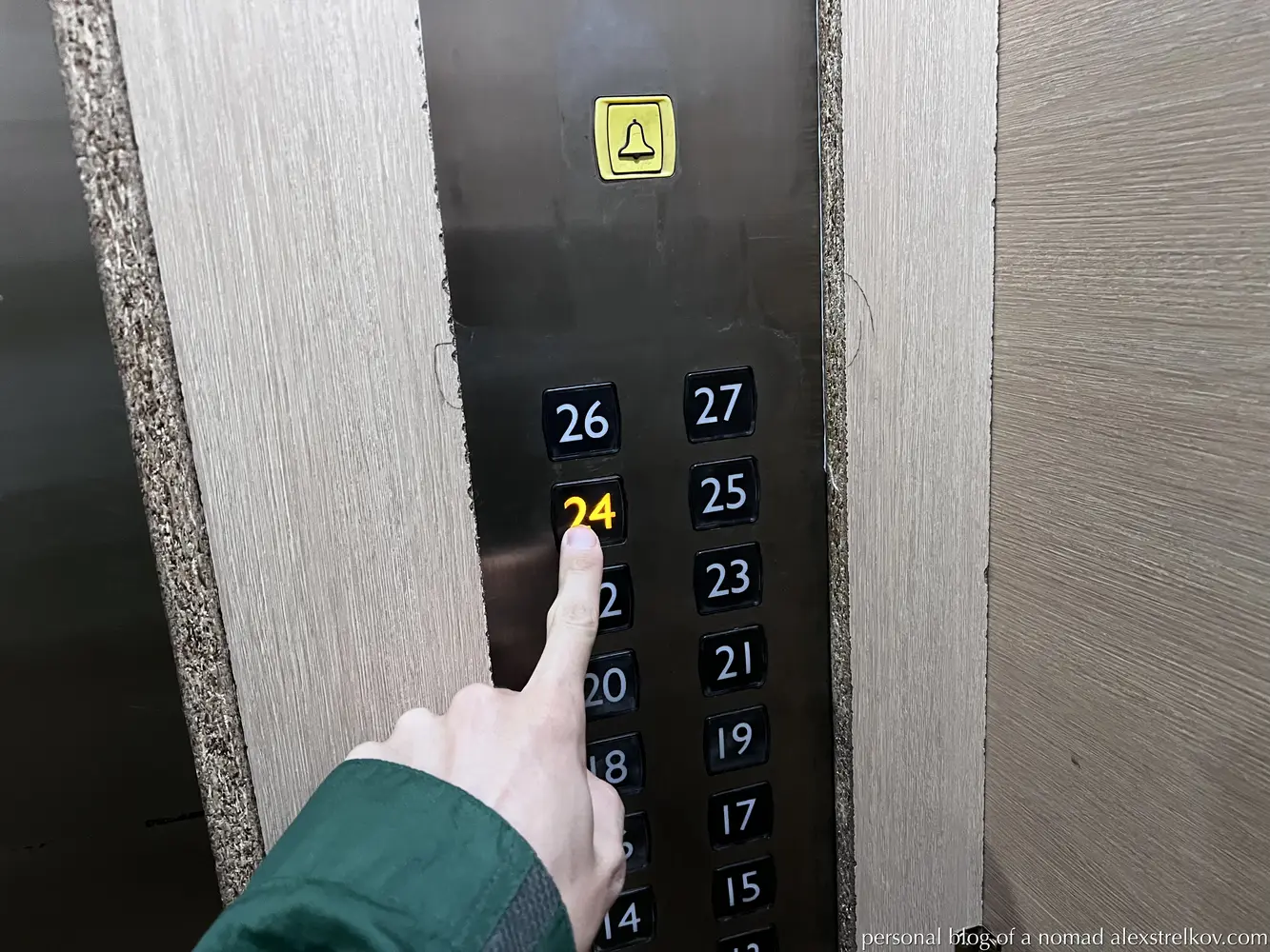 24th floor button in the Times Plaza building elevator