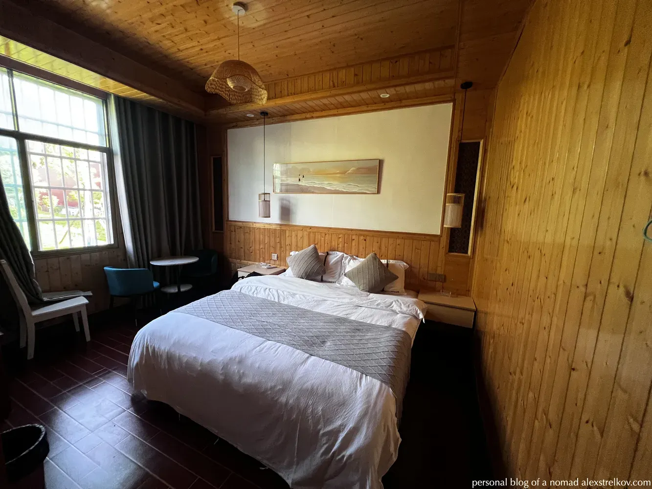 wooden interior of Gaolaozhuang Inn room, Furong Town hotel, double bed