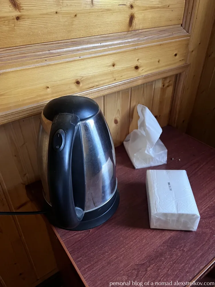 electric kettle and tissues on bedside table, Gaolaozhuang Inn Furong Town