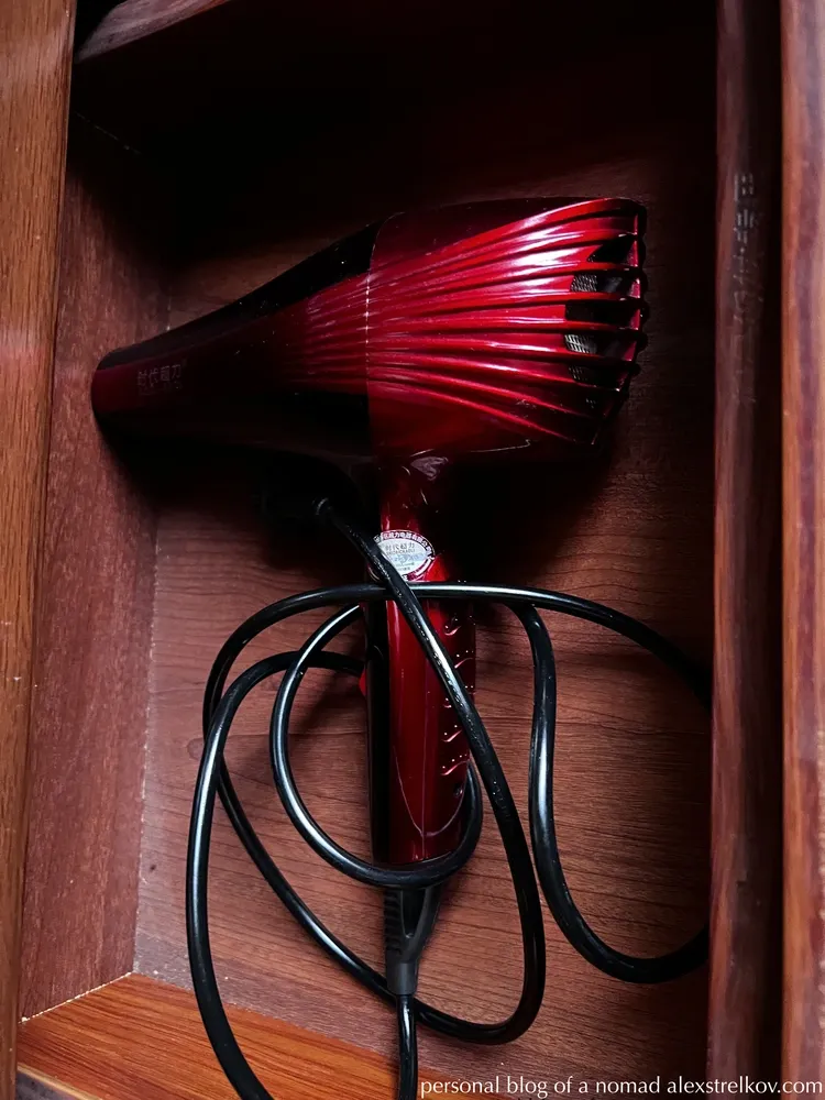 red bedside lamp on wooden nightstand, Gaolaozhuang Inn Furong