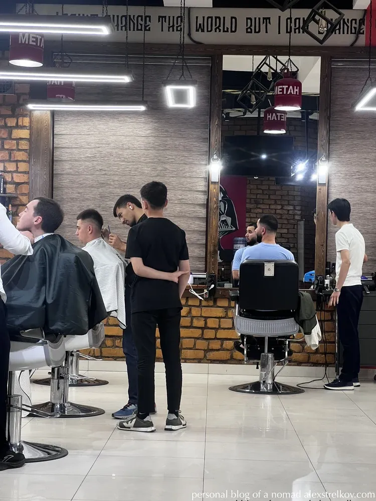 barbers working Samarkand barbershop apprentices learning